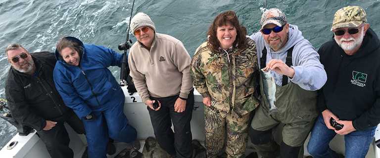 Les and Lynn Jones (left) fish with DU staff and volunteers