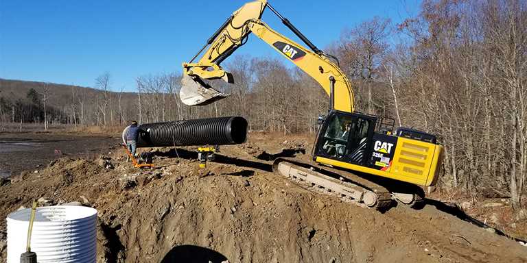 Crews restoring Del Reeves Marsh in central Connecticut
