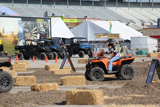 2022 DUX attendee takes part in the ATV Village ATV test drive. 