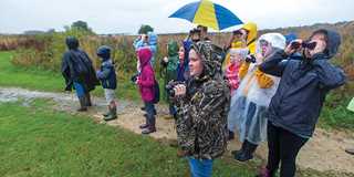 School groups visit regularly to learn about wetlands, wildlife, and the importance of conservation.